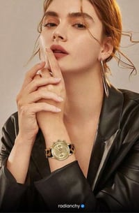 a woman with a watch on her wrist