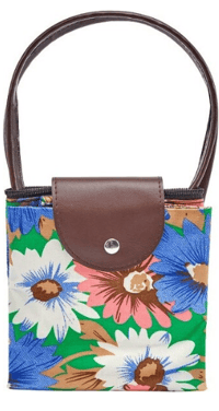 a small purse with a floral print on it