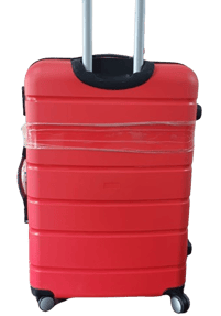 a red fiber suitcase trolley with black handle 