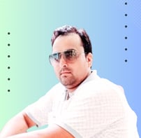 a man in a white shirt and sunglasses is Kayyum Khan