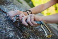 Trad climbing, clipping and old piton
