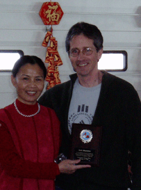 Bob receiving 10 year award from GrandMaster Aiping Cheng in 2008.