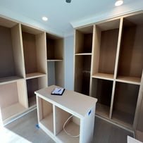 Custom white closet refinishing in Phoenix, transforming storage spaces with a sleek and professional finish.