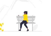 a person sitting on a bench with a bird on it