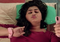Big Basket, Aditya Satyajit, One For Love, a woman laying on a bed taking selfie with phone, TVC, Ad