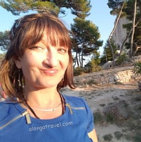 Alonga travel the author in Dubrovnik smiling happily about being there