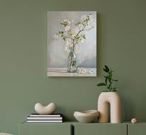 a vase with flowers in a vase on a table