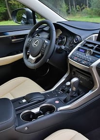 a car dashboard with a steering wheel and dashboard