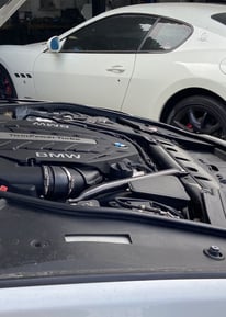 a car with a engine in the engine bay