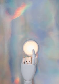 a hand is clicking a button to the innovations..