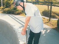 a kid about to skateboard