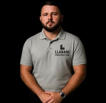a man in a polo shirt and a watch on his wrist