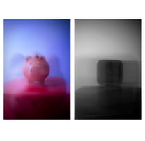 photography of a pig bank and a clock black and white