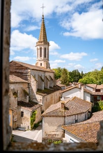 a church steeple with a steeple tower in the background