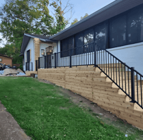 a house with a fenced deck nashville construction