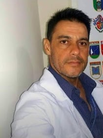 a man in a lab coat and a white lab coat