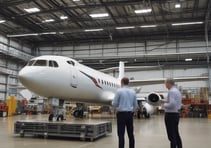 a very tall building in the middle of a city