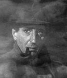 a man in a hat and a hat