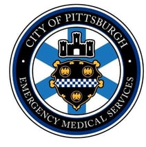 Pittsburgh EMS Department Blue and White Badge Logo