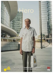 a man in a white shirt and a bag of food a movie poster for the film HERO