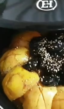 a paninized bundts with a bowl of fruit