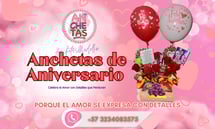 a gift box with balloons and balloons for an anniversary