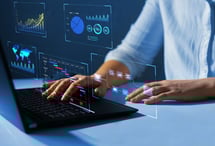 Laptop displaying accounting software dashboard with analytics.