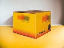 Corrugated folding carton for Alternator
