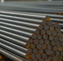 a pile of metal bars with a pile of metal bars