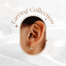a woman's earrings and earrings with a ring on it