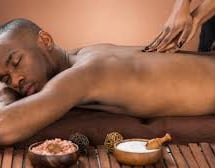 Guy getting a body to body massage
