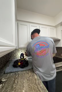 Handyman working on electrical outlet