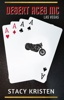 A pair of cards with a motorcycle in the background.