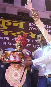 Manohar Brass Band receiving an award at the Gangaur Festival in Ajmer for their excellent performance.