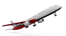 a large jetliner flying in the air