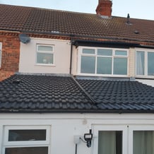 After photo of a Hull house roof, fully jetwashed and freshly painted black for a modern, restored finish