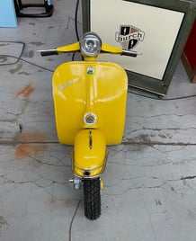 Front face of full-size vespa Yellow vintage wall decoration,vintage wall decor, old vintage,