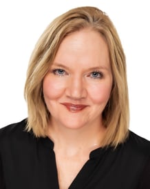 a woman with blonde hair and blue eyes