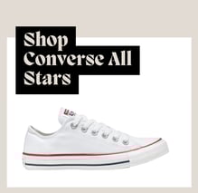 a pair of white converse sneakers with the words shop converse all stars
