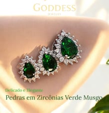 a pair of emerald green earrings with diamonds
