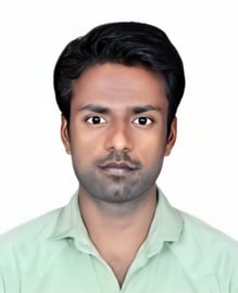 a man with a beard and a green shirt