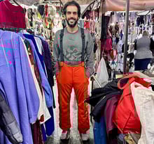 a man standing in friday market