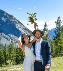 Bride and groom celebrating their elopement in banff