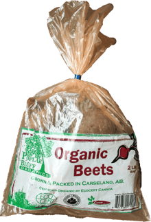 Clear plastic bag of beets with Poplar Bluff Organics logo