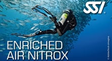 a scuba diver in a scuba suit with a scuba diver in the background