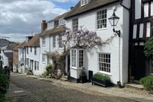 photograph of beautiful street in a small village in england