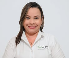 a woman in a white shirt and black pants