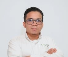 a man in a white shirt and glasses