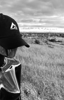 Dimensional being with a hat
