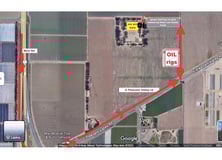 a map of a road with a red arrow pointing to the right